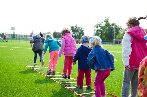 Outdoor sports area with play equipment for active children